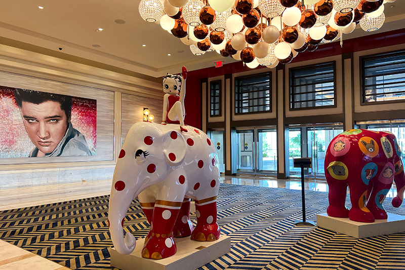 A picture of Elvis and Elephant designed in Betty Boop style sti in a Resorts World casino entrance